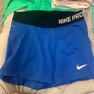 Blue Nike pro shorts